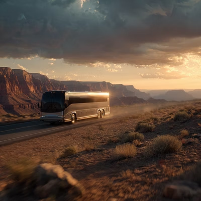 Tour bus rolling through canyon country at golden hour